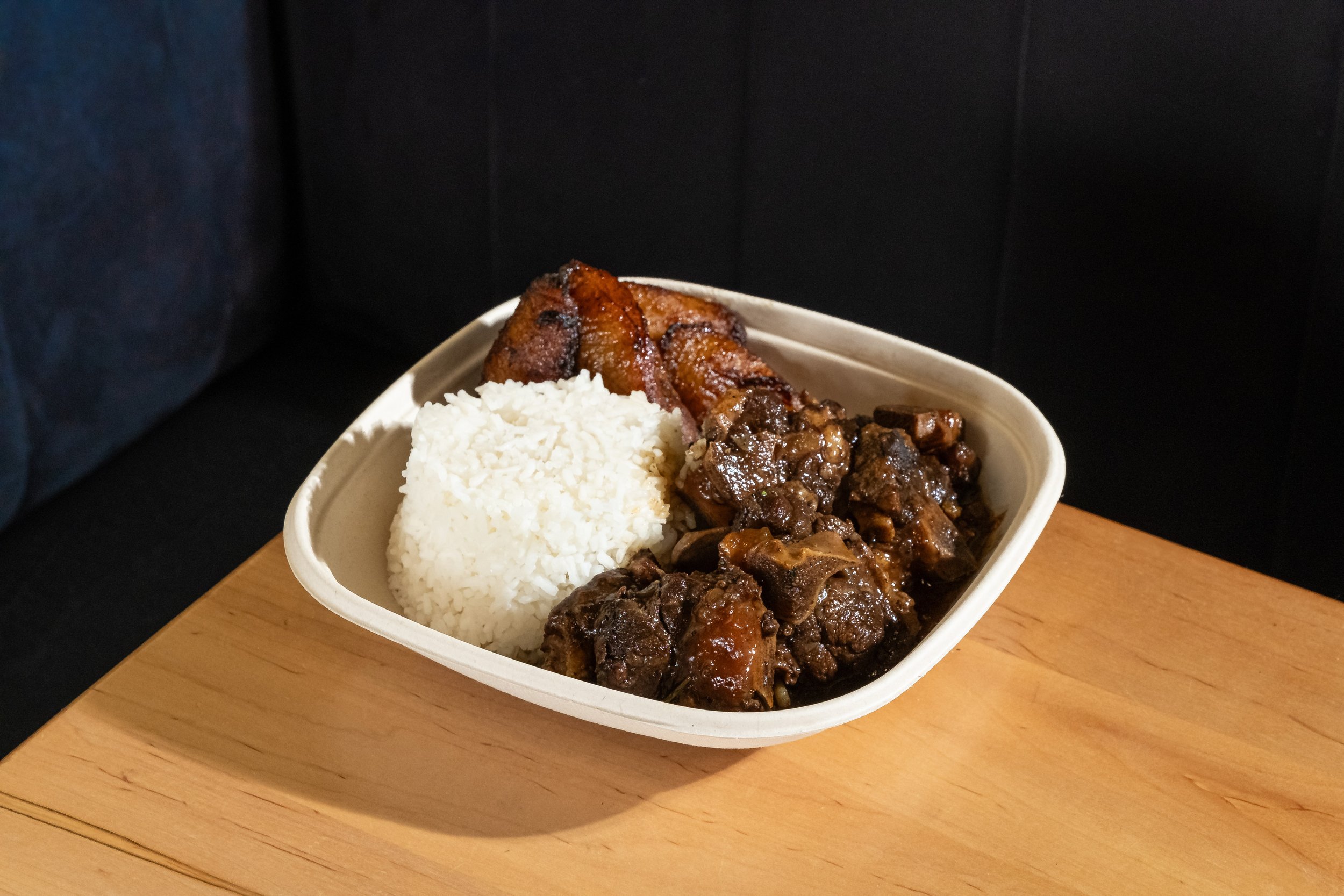Braised oxtails served with white rice